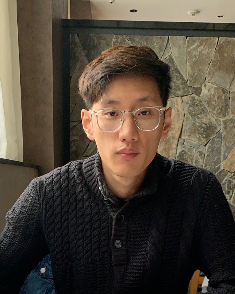 Portrait of Yuansong Ge, co-founder of AssureCare